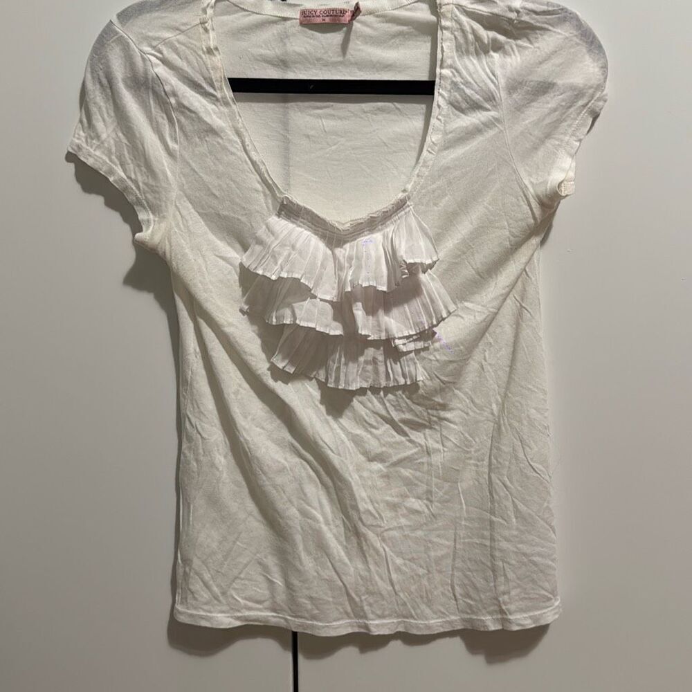 Juicy couture white ruffle top size medium   Vintage! Has small pin hole‎ in the